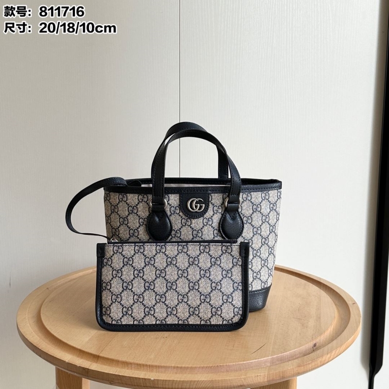 G*u*i shopping bags